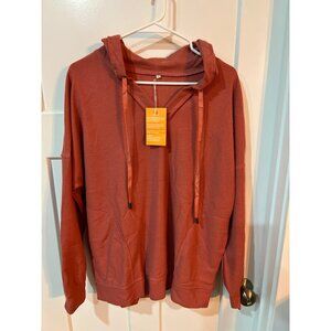 Boardwalk High Hip Hoodie in Canyon Orange.